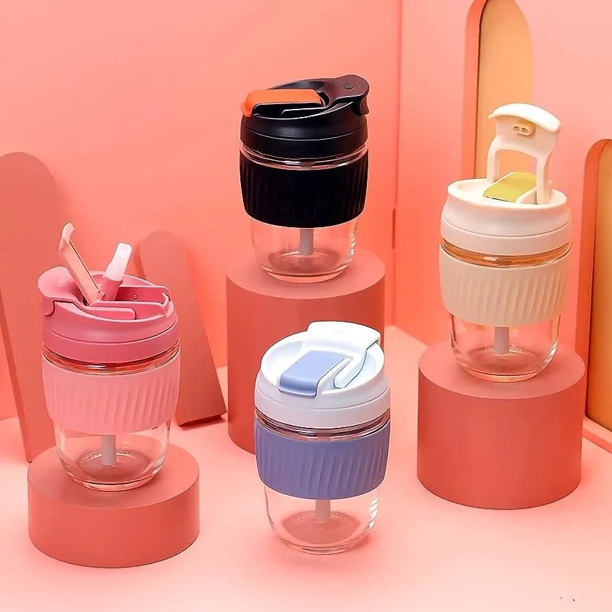 Glass tumbler with airtight lid and straw for juice, coffee, and smoothies